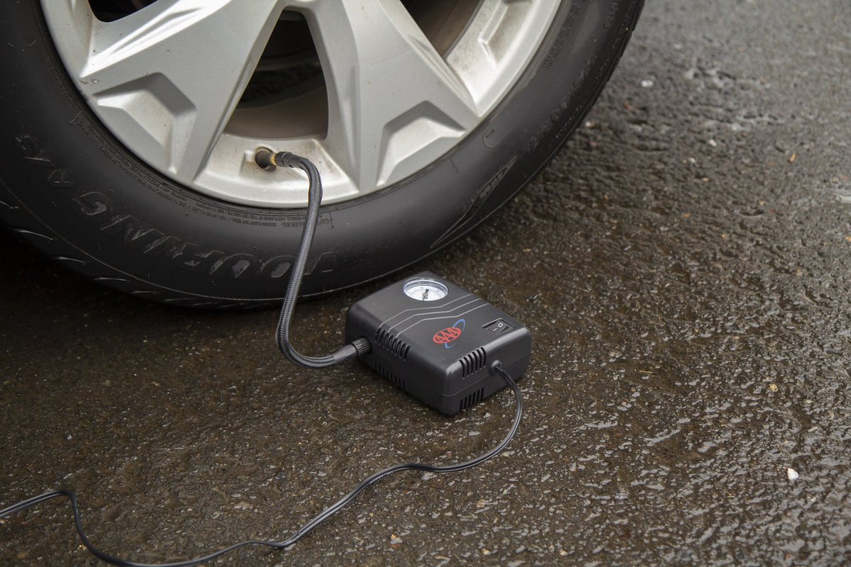 AAA Mini Tire Inflator In Use